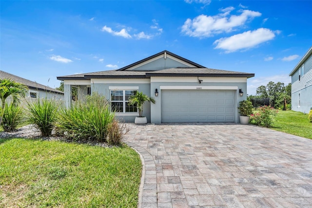 30801 Parrot Reef Ct, Wesley Chapel, FL 33545 - single story home featuring stucco siding, decorative driveway, an attached garage, and a front lawn