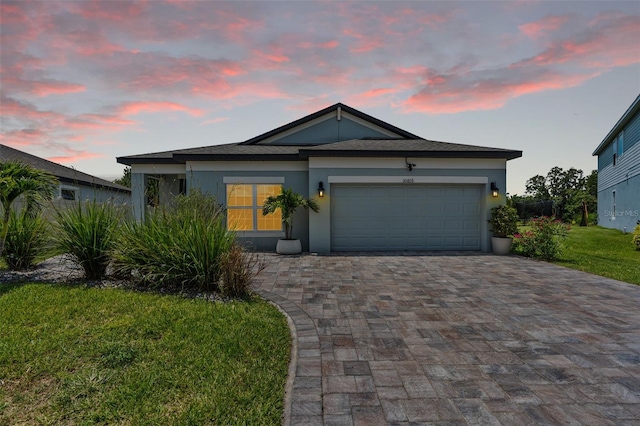 30801 Parrot Reef Ct, Wesley Chapel, FL 33545 - ranch-style home with stucco siding, decorative driveway, an attached garage, and a front yard