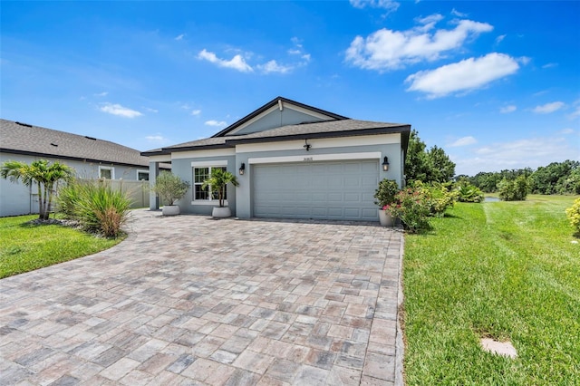 30801 Parrot Reef Ct, Wesley Chapel, FL 33545 - single story home with stucco siding, an attached garage, and decorative driveway