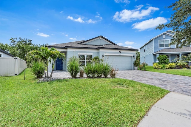 30801 Parrot Reef Ct, Wesley Chapel, FL 33545 - ranch-style home featuring decorative driveway, a garage, and stucco siding
