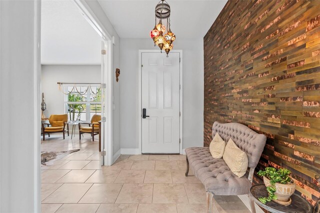 30801 Parrot Reef Ct, Wesley Chapel, FL 33545 - entryway with an accent wall, light tile patterned floors, and baseboards