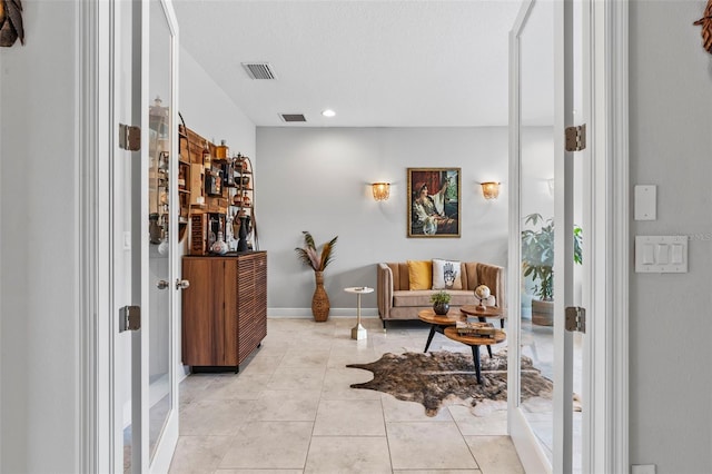 30801 Parrot Reef Ct, Wesley Chapel, FL 33545 - living area featuring light tile patterned flooring and recessed lighting