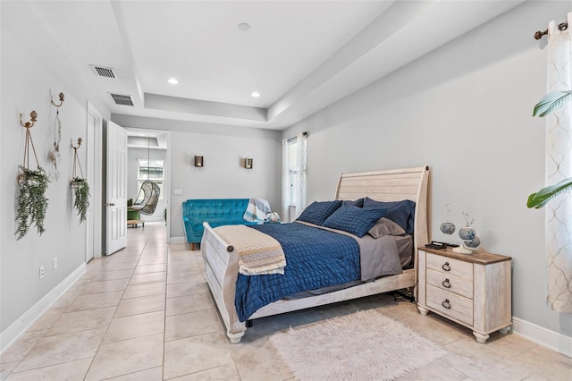30801 Parrot Reef Ct, Wesley Chapel, FL 33545 - bedroom with baseboards, light tile patterned floors, a raised ceiling, and recessed lighting