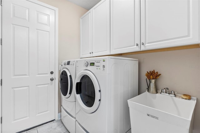30801 Parrot Reef Ct, Wesley Chapel, FL 33545 - washroom with washer and dryer and cabinet space
