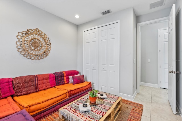 30801 Parrot Reef Ct, Wesley Chapel, FL 33545 - living room with light tile patterned floors, recessed lighting, and baseboards