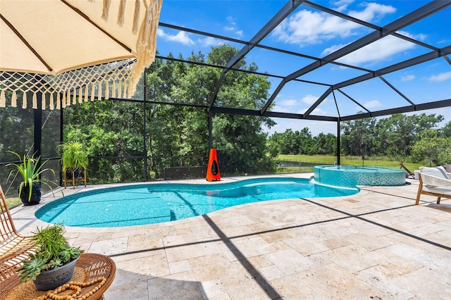 30801 Parrot Reef Ct, Wesley Chapel, FL 33545 - view of pool featuring a patio area, a pool with connected hot tub, view of scattered trees, and a lanai