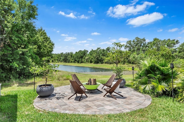 30801 Parrot Reef Ct, Wesley Chapel, FL 33545 - view of patio with a water view and an outdoor fire pit