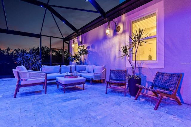 30801 Parrot Reef Ct, Wesley Chapel, FL 33545 - patio at twilight with a patio, an outdoor hangout area, and a lanai