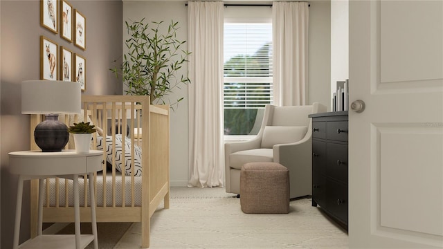 214 SE 27th St, Ruskin, FL 33570 - carpeted bedroom featuring a crib and baseboards