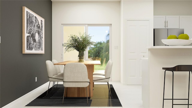 214 SE 27th St, Ruskin, FL 33570 - dining space featuring baseboards