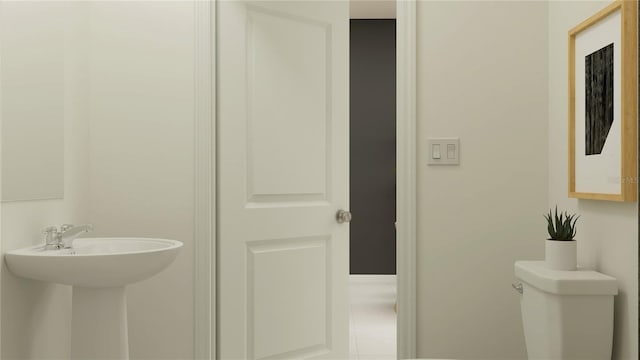 214 SE 27th St, Ruskin, FL 33570 - bathroom with toilet and tile patterned flooring