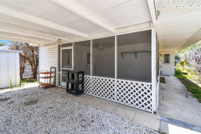 123 14th Ave, Indian Rocks Beach, FL 33785 - view of patio featuring a sunroom and an attached carport