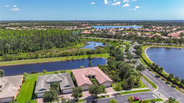 15860 Aurora Lake Cir, Wimauma, FL 33598 - aerial perspective of suburban area featuring a large body of water