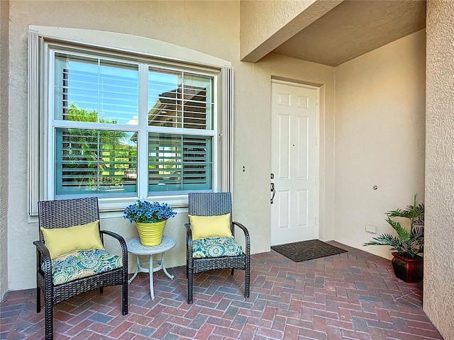 15860 Aurora Lake Cir, Wimauma, FL 33598 - property entrance with stucco siding