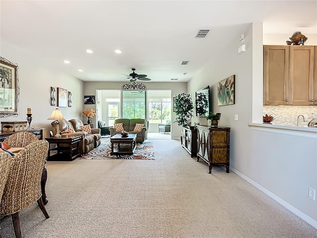 15860 Aurora Lake Cir, Wimauma, FL 33598 - living room featuring light carpet, ceiling fan, recessed lighting, and baseboards
