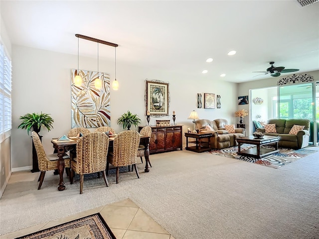 15860 Aurora Lake Cir, Wimauma, FL 33598 - tiled dining room with carpet, a ceiling fan, and recessed lighting