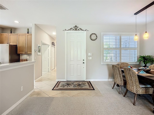 15860 Aurora Lake Cir, Wimauma, FL 33598 - foyer featuring light tile patterned floors, baseboards, and recessed lighting