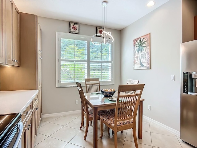 15860 Aurora Lake Cir, Wimauma, FL 33598 - dining area with a chandelier, light tile patterned floors, baseboards, and recessed lighting