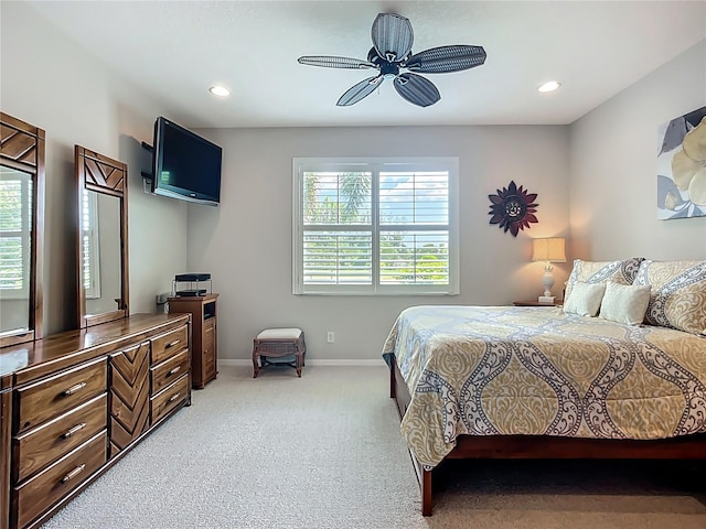 15860 Aurora Lake Cir, Wimauma, FL 33598 - bedroom with light colored carpet, baseboards, ceiling fan, and recessed lighting