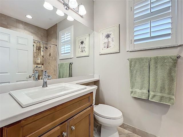 15860 Aurora Lake Cir, Wimauma, FL 33598 - full bath with toilet, vanity, tiled shower, and tile patterned floors