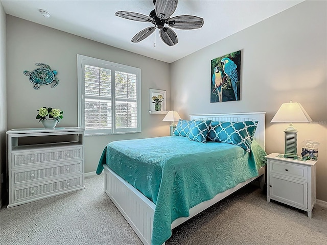 15860 Aurora Lake Cir, Wimauma, FL 33598 - bedroom with carpet flooring, baseboards, and a ceiling fan