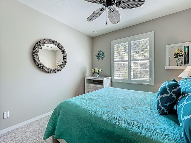 15860 Aurora Lake Cir, Wimauma, FL 33598 - bedroom with carpet flooring, baseboards, and ceiling fan
