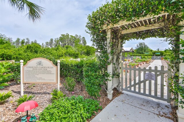 15860 Aurora Lake Cir, Wimauma, FL 33598 - community / neighborhood sign featuring a gate