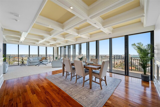7600 Bayshore Dr Unit 1201A, Treasure Island, FL 33706 - sunroom / solarium featuring coffered ceiling and beam ceiling