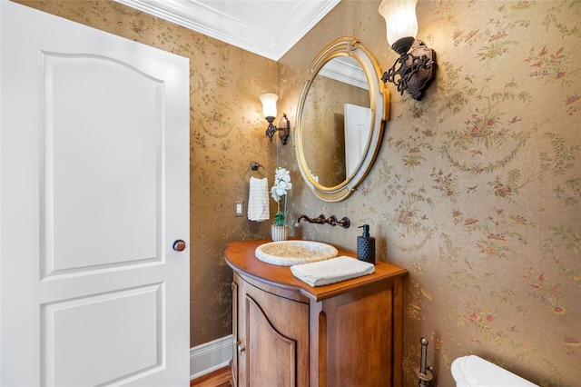 7600 Bayshore Dr Unit 1201A, Treasure Island, FL 33706 - half bath with vanity, toilet, and ornamental molding