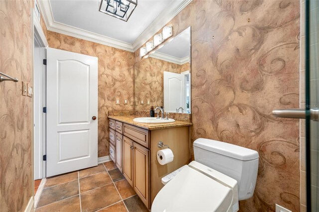 7600 Bayshore Dr Unit 1201A, Treasure Island, FL 33706 - bathroom featuring vanity, baseboards, ornamental molding, toilet, and wallpapered walls