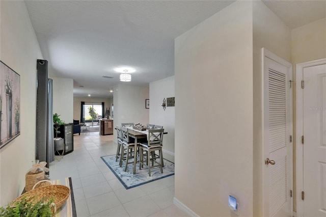 1398 Crescent Hoop Way, Wesley Chapel, FL 33543 - dining room with light tile patterned floors and baseboards