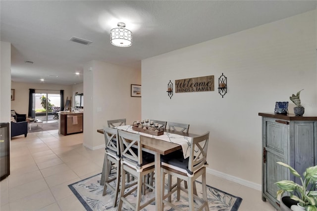 1398 Crescent Hoop Way, Wesley Chapel, FL 33543 - dining area featuring light tile patterned floors and baseboards
