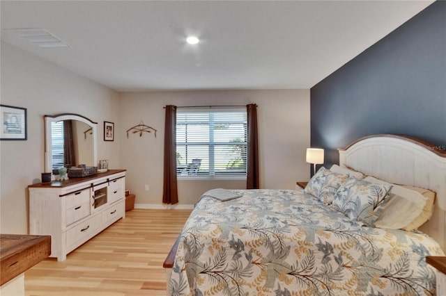 1398 Crescent Hoop Way, Wesley Chapel, FL 33543 - bedroom featuring light wood-style floors