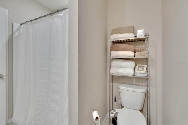 1398 Crescent Hoop Way, Wesley Chapel, FL 33543 - full bathroom featuring toilet and a shower with curtain