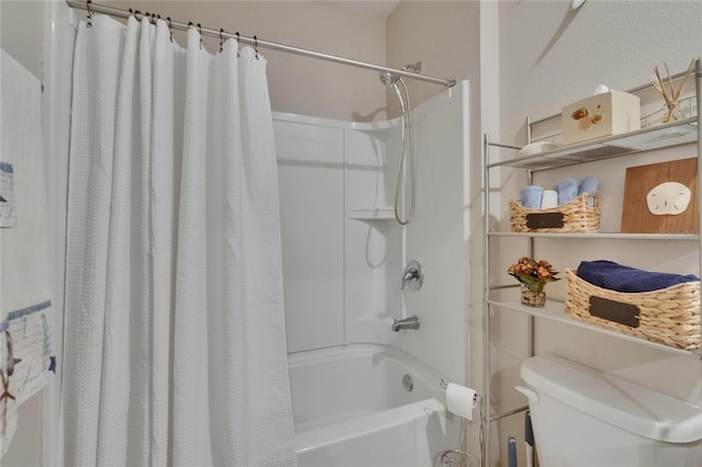 1398 Crescent Hoop Way, Wesley Chapel, FL 33543 - bathroom featuring shower / bath combo with shower curtain and toilet