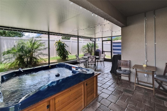 1398 Crescent Hoop Way, Wesley Chapel, FL 33543 - sunroom / solarium featuring a jacuzzi