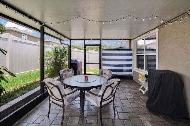 1398 Crescent Hoop Way, Wesley Chapel, FL 33543 - sunroom / solarium with outdoor dining space