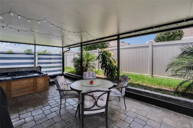 1398 Crescent Hoop Way, Wesley Chapel, FL 33543 - sunroom featuring a jacuzzi and outdoor dining area
