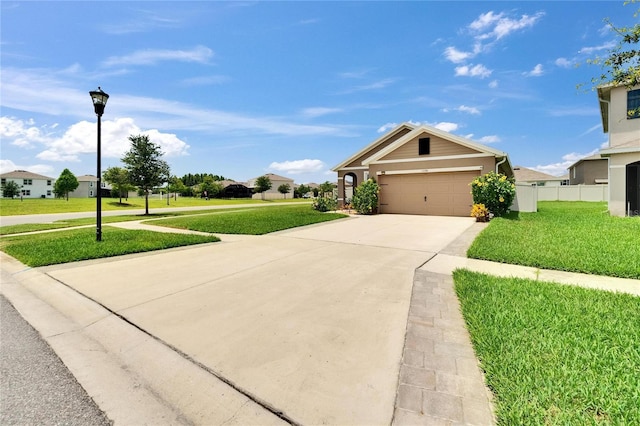 1398 Crescent Hoop Way, Wesley Chapel, FL 33543 - view of front of home with concrete driveway and a garage