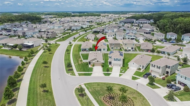 1398 Crescent Hoop Way, Wesley Chapel, FL 33543 - aerial view of property and surrounding area with nearby suburban area and a nearby body of water