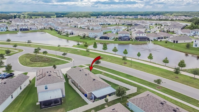1398 Crescent Hoop Way, Wesley Chapel, FL 33543 - aerial perspective of suburban area with a nearby body of water