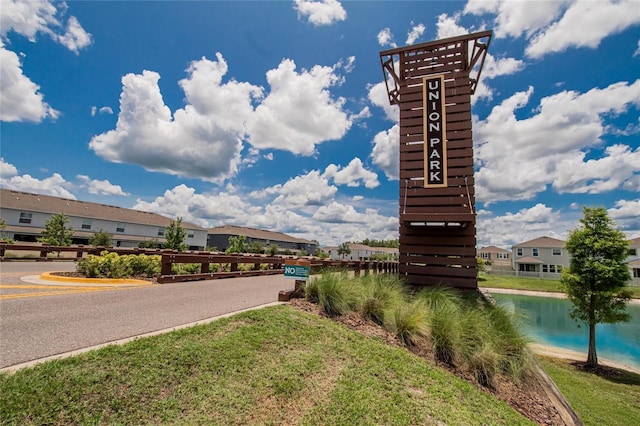 1398 Crescent Hoop Way, Wesley Chapel, FL 33543 - view of asphalt street with curbs, a water view, and a residential view