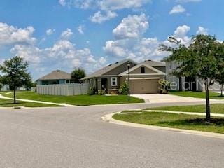 1398 Crescent Hoop Way, Wesley Chapel, FL 33543 - view of front of home with driveway and a garage