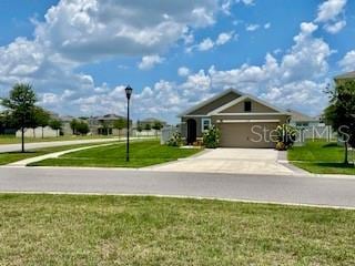 1398 Crescent Hoop Way, Wesley Chapel, FL 33543 - view of road with street lighting