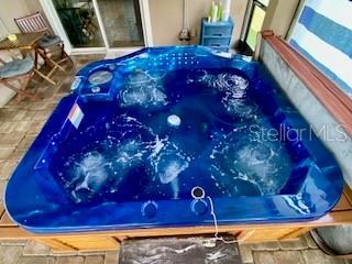 1398 Crescent Hoop Way, Wesley Chapel, FL 33543 - exterior view of a jacuzzi