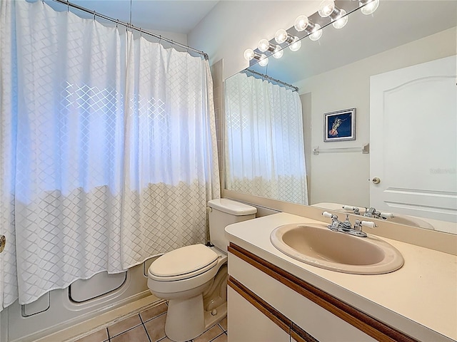 2973 Spring Oak Ct, Palm Harbor, FL 34684 - full bathroom with tile patterned floors, vanity, toilet, and shower / bathtub combination with curtain