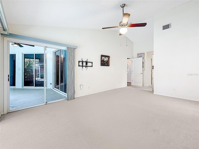 2973 Spring Oak Ct, Palm Harbor, FL 34684 - empty room with ceiling fan, carpet floors, and high vaulted ceiling
