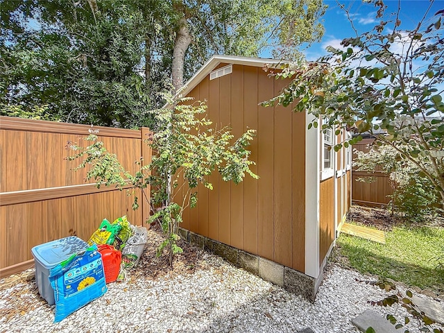 2973 Spring Oak Ct, Palm Harbor, FL 34684 - view of shed with a fenced backyard