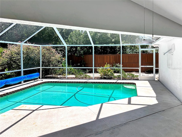 2973 Spring Oak Ct, Palm Harbor, FL 34684 - view of pool featuring a fenced backyard, a patio area, and glass enclosure