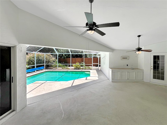 2973 Spring Oak Ct, Palm Harbor, FL 34684 - view of pool with a ceiling fan, a patio area, and glass enclosure